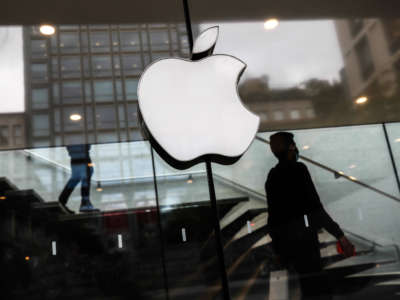 Apple logo is seen on the store in Milan, Italy, on October 6, 2021.