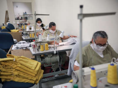 Women sew masks in prison