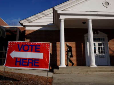 Voters enter a polling station at the Zion Baptist Church on January 5, 2021, in Marietta, Georgia.