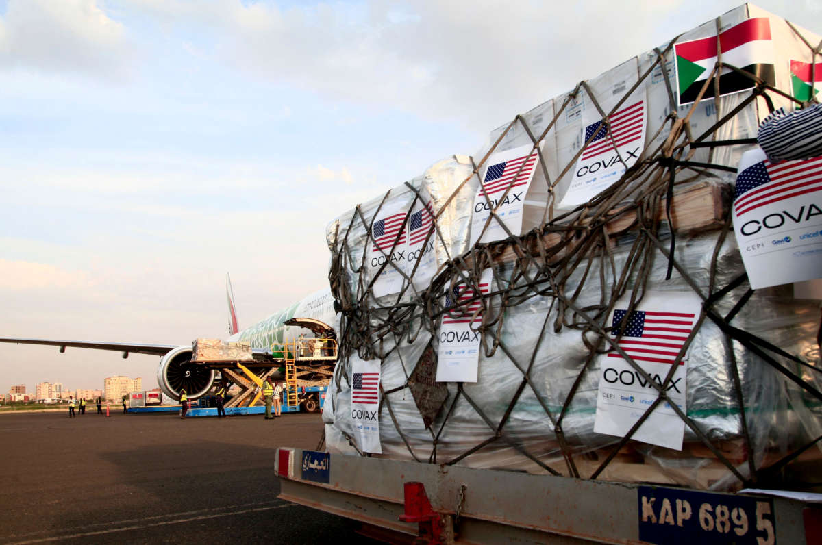 A shipment of COVID-19 vaccines sent to Sudan by the COVAX vaccine-sharing initiative are unloaded at the airport in the capital Khartoum, on October 6, 2021.