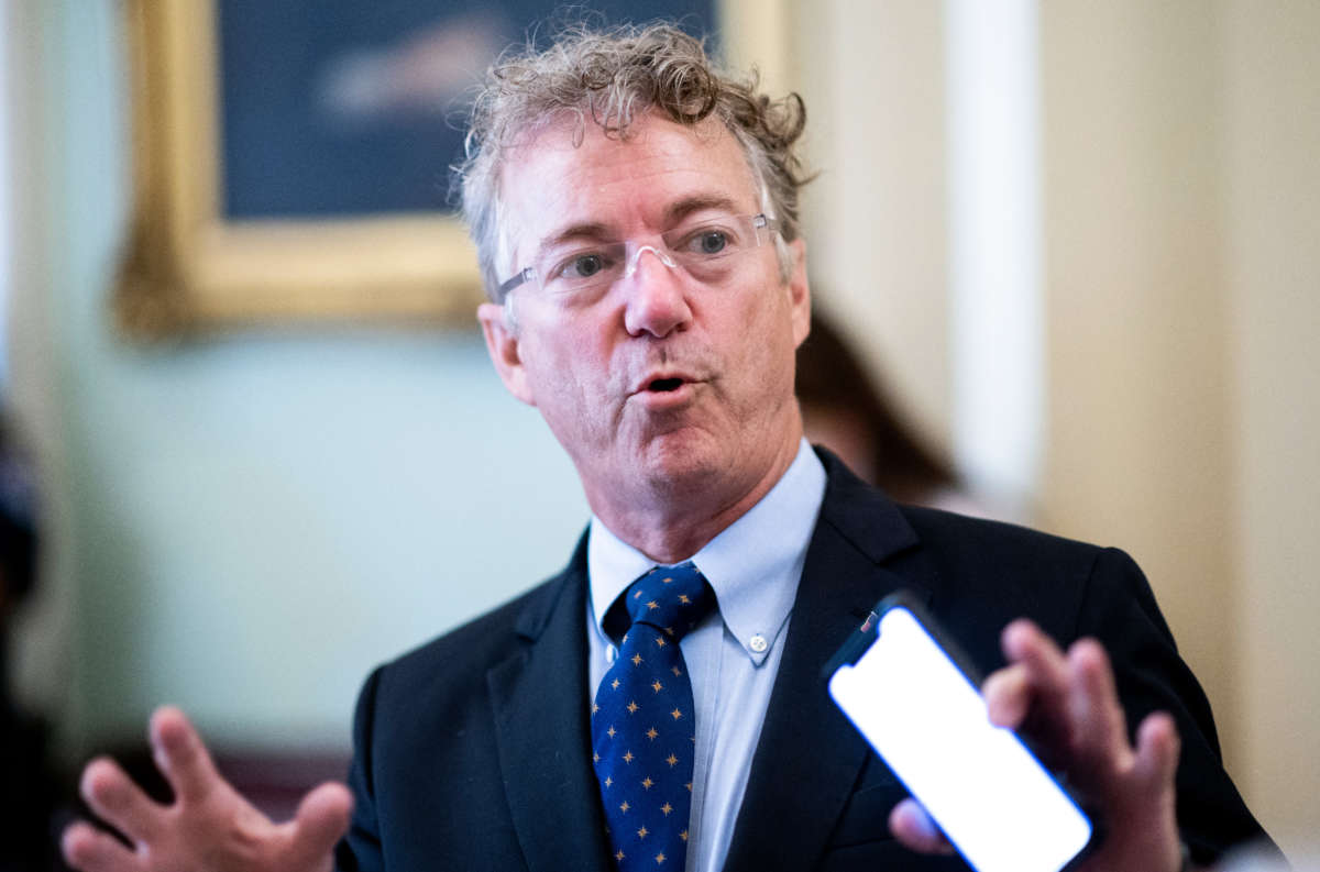 Sen. Rand Paul speaks with a reporter in the Ohio Clock Corridor in the Capitol on September 30, 2021.