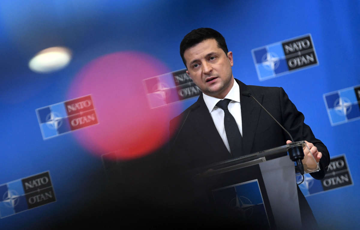 Ukrainian President Volodymyr Zelensky talks during a press conference with the NATO secretary general after their bilateral meeting at the European Union headquarters in Brussels on December 16, 2021.