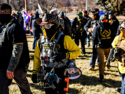 Members of the Proud Boys join Donald Trump supporters as they protest the election outside the Colorado State Capitol on January 6, 2021, in Denver, Colorado.