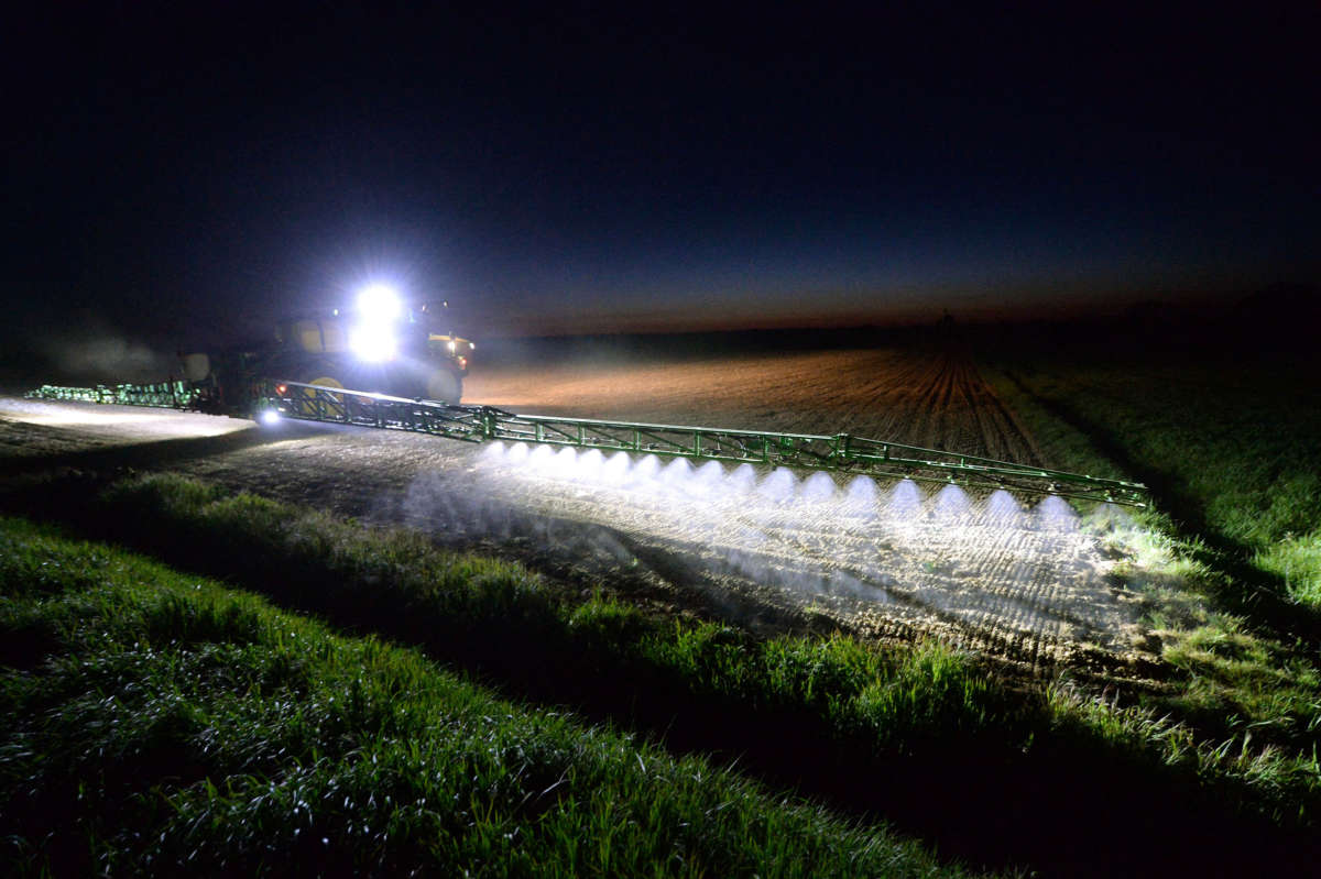 A French farmer sprays glyphosate herbicide "Roundup 720" made by agrochemical giant Monsanto in Piacé in northwestern France, on April 23, 2021.