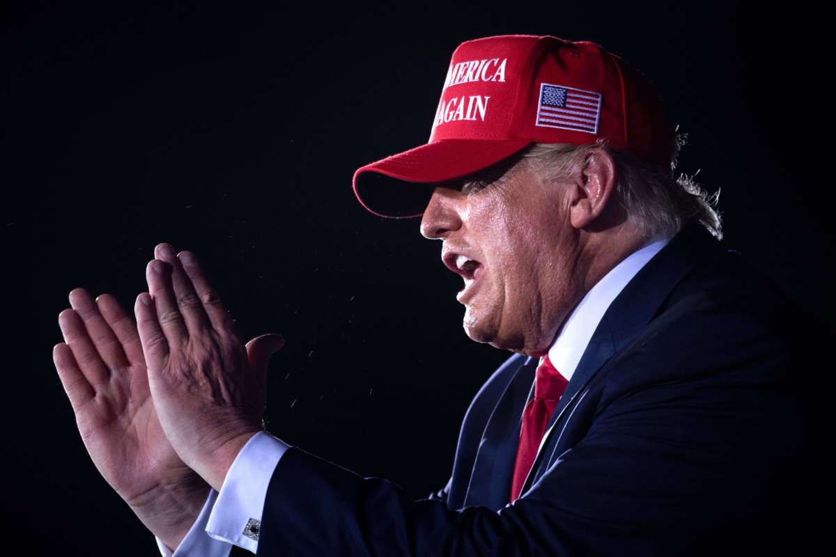 President Donald Trump leaves after speaking during a Make America Great Again rally at Miami-Opa Locka Executive Airport in Opa Locka, Florida, on November 2, 2020.