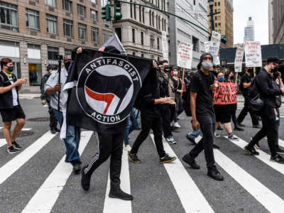 Anti-fascist demonstrators hold a counter protest against right-wing demonstrators participating in a political rally on July 25, 2021, in New York City.