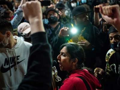 Seattle City Council member Kshama Sawant speaks as demonstrators hold a rally outside of the Seattle Police Department's East Precinct on June 8, 2020 in Seattle, Washington.