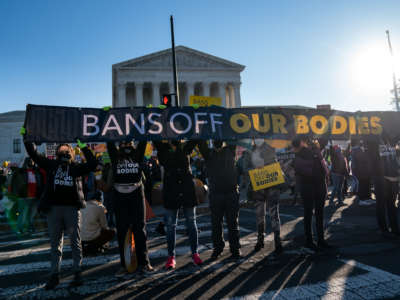 Abortion rights advocates demonstrate in front of the Supreme Court on December 1, 2021, in Washington, D.C.