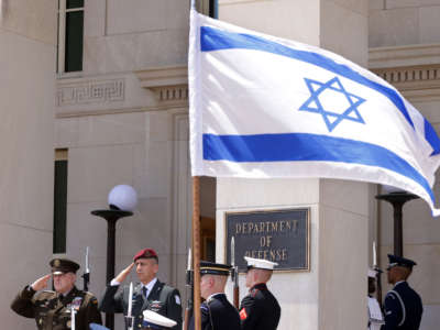 U.S. Chairman of the Joint Chiefs of Staff Gen. Mark Milley (left) participates in an enhanced honor cordon to welcome Israeli Chief of Defense and Deputy Prime Minister Benny Gantz (second from the left) at the Pentagon on June 21, 2021n in Arlington, Virginia. Gantz was in Washington for talks with officials at the Pentagon.