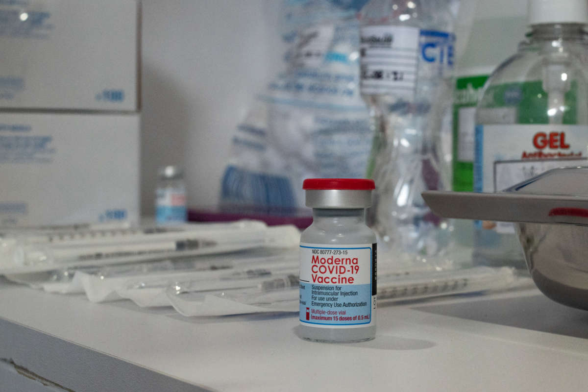 A vial of the Moderna COVID-19 vaccine is seen as people from ages 25 to 30 start their vaccination phase in Medellín, Antioquia, Colombia, on August 2, 2021.