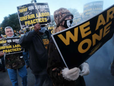 Hundreds of members of the United Mine Workers of America march to the Manhattan headquarters of BlackRock, the largest shareholder in the mining company Warrior Met Coal, on November 4, 2021, in New York City.