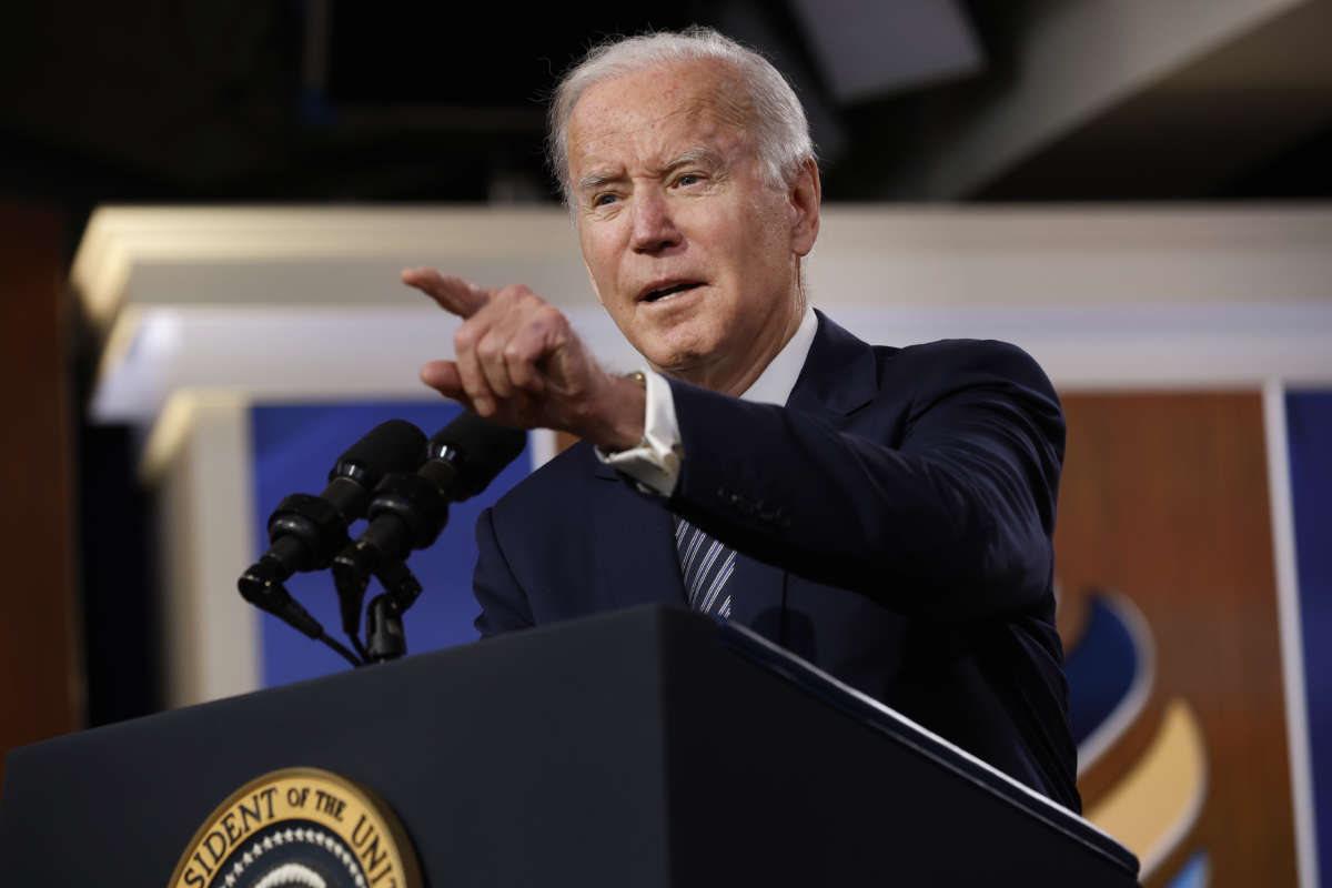 President Joe Biden answers reporters' questions after delivering closing remarks for the White House's virtual Summit For Democracy in the Eisenhower Executive Office Building on December 10, 2021 in Washington, D.C.