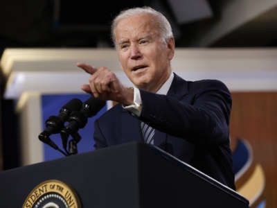 President Joe Biden answers reporters' questions after delivering closing remarks for the White House's virtual Summit For Democracy in the Eisenhower Executive Office Building on December 10, 2021 in Washington, D.C.