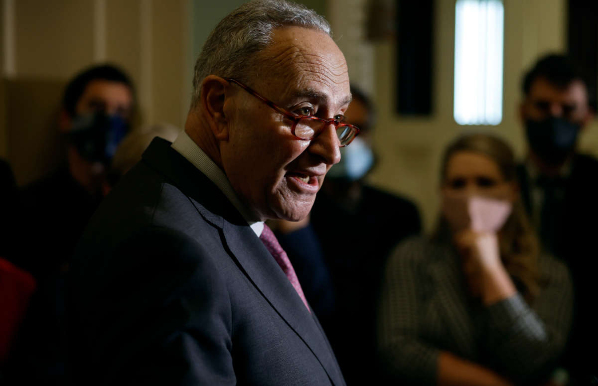 Senate Majority Leader Charles Schumer talks to reporters following the weekly Senate Democratic policy luncheon at the U.S. Capitol on December 14, 2021, in Washington, D.C.