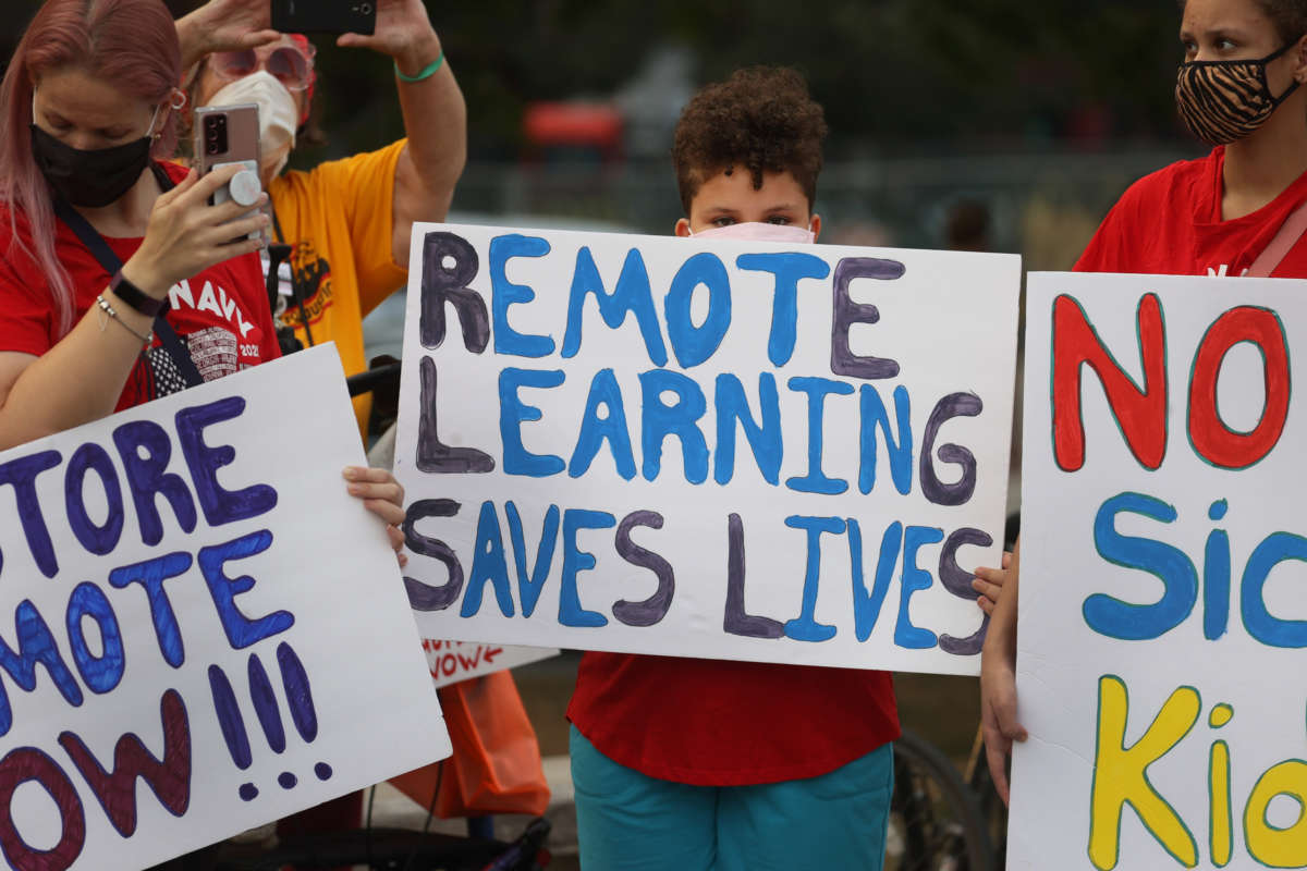 Chicago Public School teachers, parents and students protest in the neighborhood of Mayor Lori Lightfoot on September 13, 2021, in Chicago, Illinois.