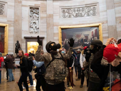 Trump supporters roam under the U.S. Capitol rotunda after breaching the Capitol Building on January 6, 2021, in Washington, D.C.