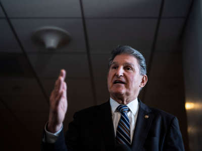 Sen. Joe Manchin speaks to reporters outside his office on Capitol Hill on January 4, 2022, in Washington, D.C.