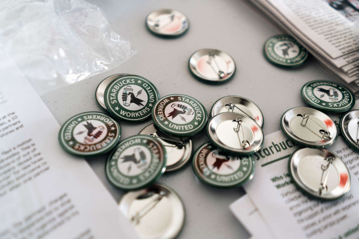 Pins are displayed at the Starbucks Workers United hub in Buffalo, New York, on November 16, 2021.