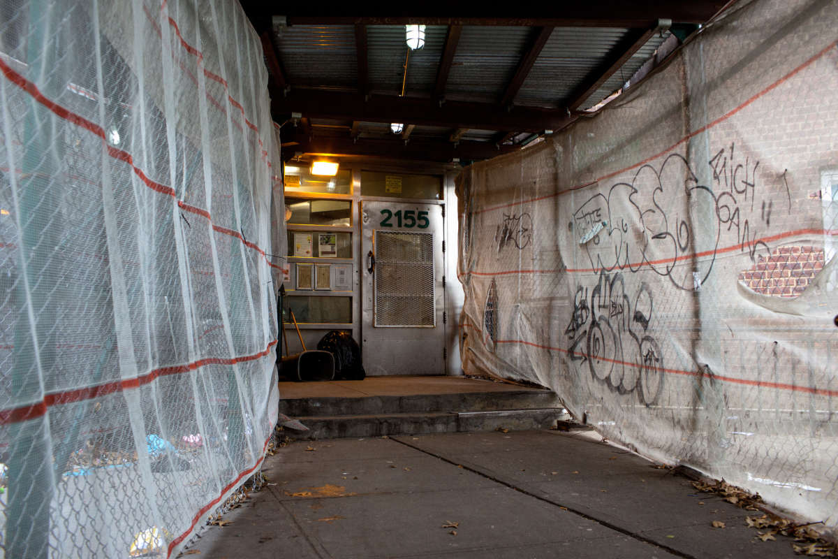 Trash piles up around scaffolding that has been up for two years at the Lincoln Houses on December 16, 2019, in Harlem, New York.