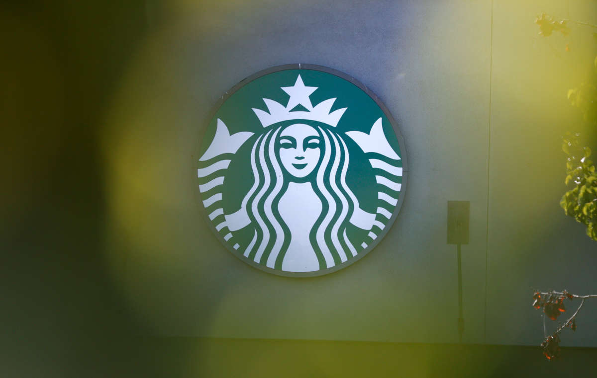 The Starbucks logo is displayed on the exterior of a store on October 29, 2021, in San Francisco, California.