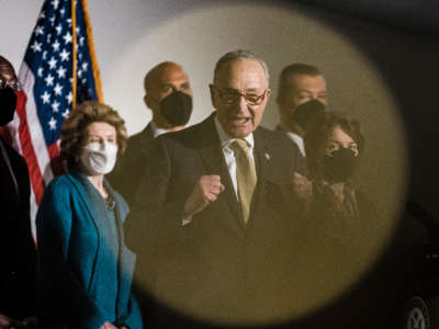 Senate Majority Leader Chuck Schumer speaks during a news conference following a Senate democratic caucus meeting on voting rights and the filibuster on Capitol Hill on January 18, 2022, in Washington, D.C.