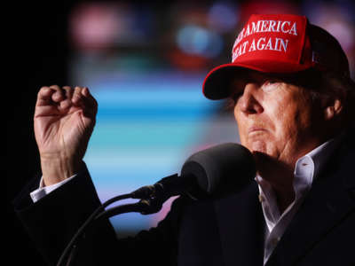 Former President Donald Trump speaks at a rally at the Canyon Moon Ranch festival grounds on January 15, 2022, in Florence, Arizona.