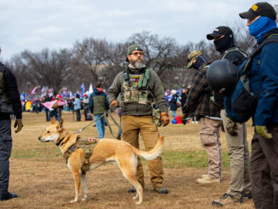 Men belonging to the Oath Keepers wearing military tactical gear attend the "Stop the Steal" rally on January 6, 2021, in Washington, D.C.