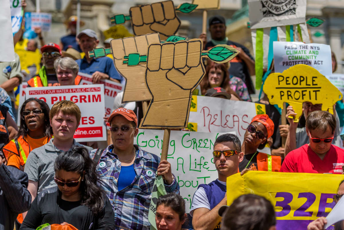 Hundreds of New Yorkers meet at the state capitol to call on Gov. Andrew Cuomo and state lawmakers to support the NYS Climate & Community Protection Act on June 1, 2016, in Albany, New York.