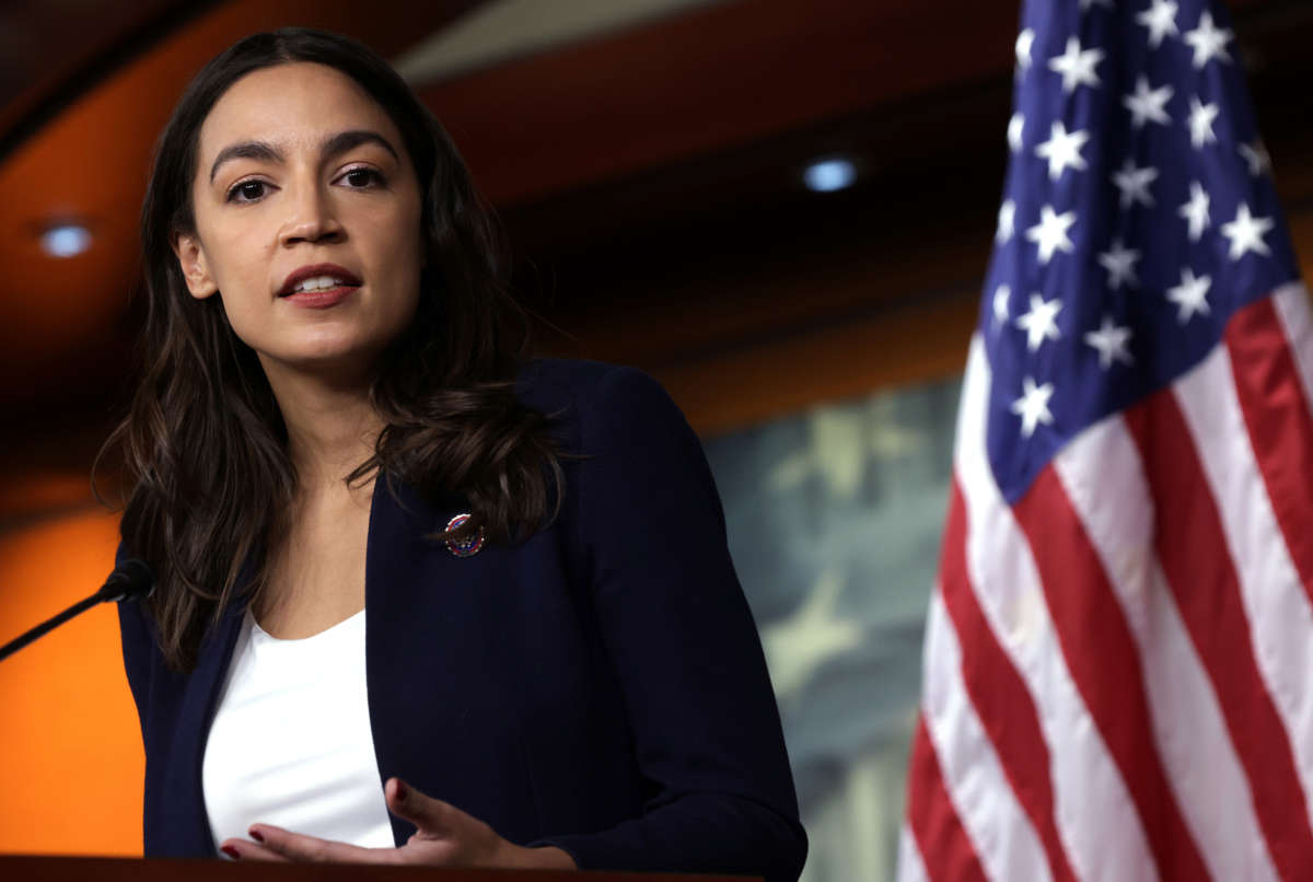 Rep. Alexandria Ocasio-Cortez speaks during a news conference at the U.S. Capitol on December 8, 2021, in Washington, D.C.