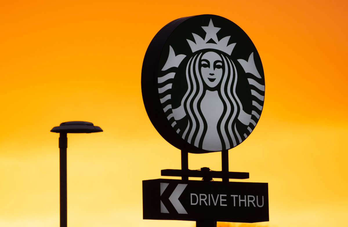 A Starbucks drive-through sign is pictured on January 18, 2022, in Cardiff, Wales.