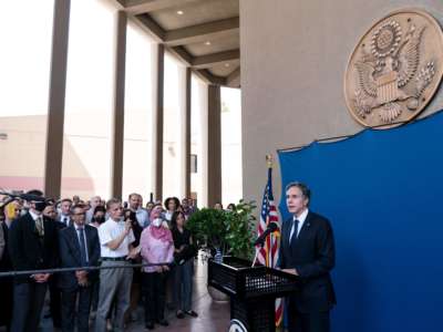 Anthony Blinken speaks at a podium