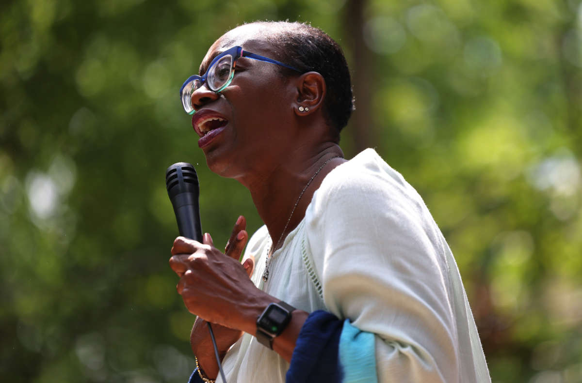 Congressional candidate Nina Turner speaks to a crowd of volunteers before a Get Out the Vote canvassing event on July 30, 2021, in Cleveland Heights, Ohio.