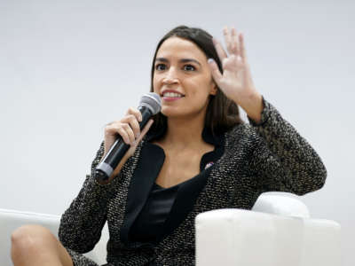 Rep. Alexandria Ocasio-Cortez speaks during an event at the U.S. Climate Action Centre during COP26 on November 9, 2021, in Glasgow, Scotland.