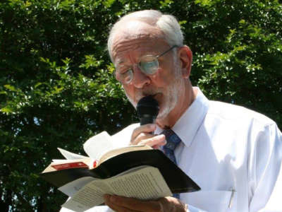 Gene McGee, mayor of Ridgeland, Mississippi, is pictured reading.