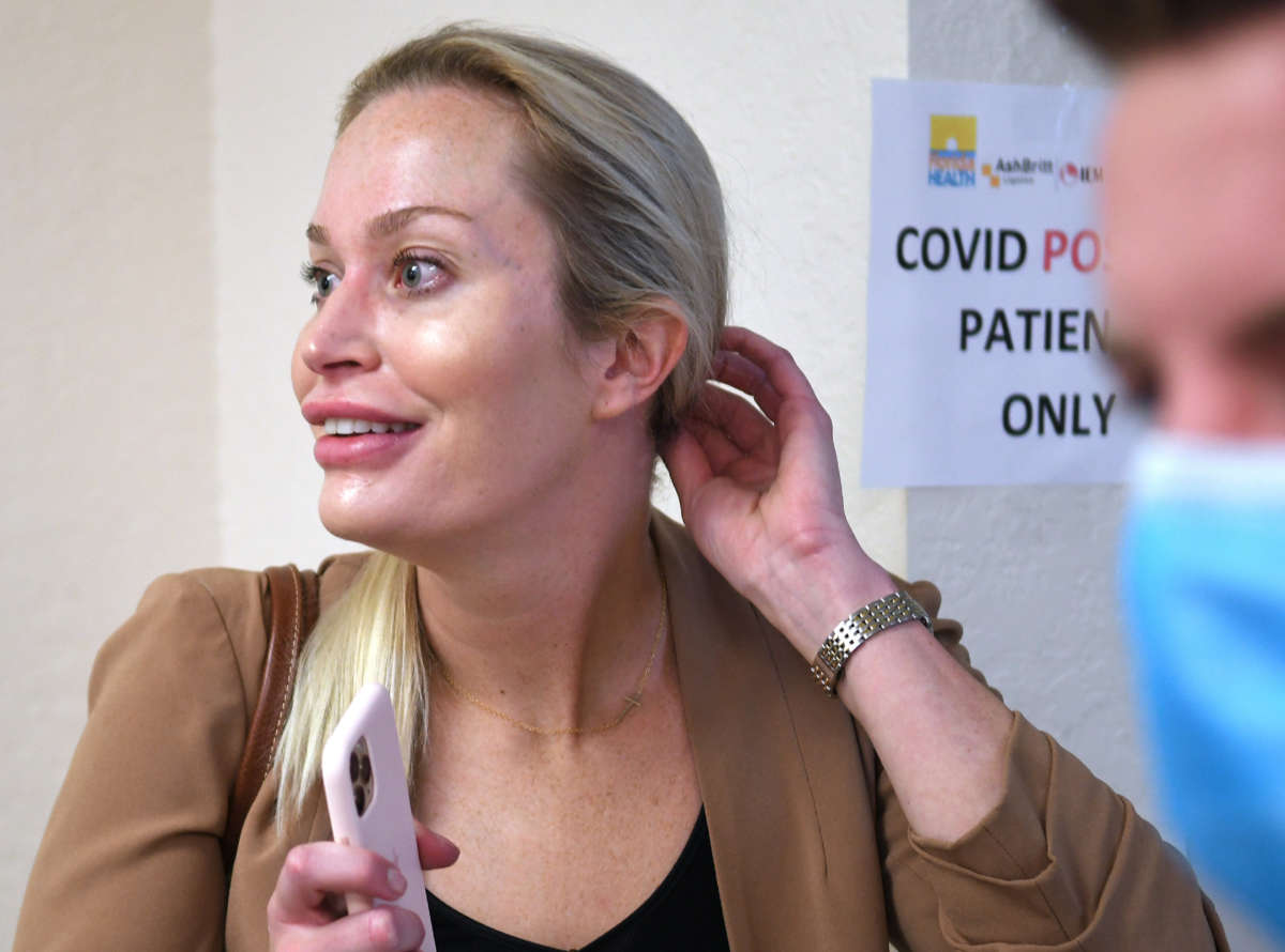 Christina Pushaw, Press Secretary for Florida Governor Ron DeSantis, attends a press conference at Lakes Church in Lakeland, Florida.