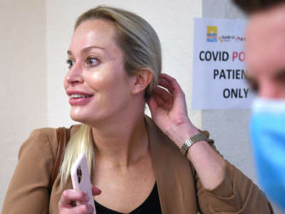 Christina Pushaw, Press Secretary for Florida Governor Ron DeSantis, attends a press conference at Lakes Church in Lakeland, Florida.