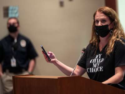 Patti Hidalgo Menders, who works for a GOP media consulting firm, speaks during a Loudoun County Public Schools board meeting in Ashburn, Virginian on October 12, 2021.