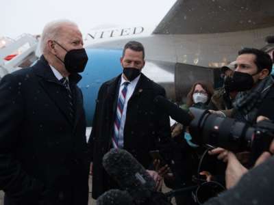 President Joe Biden speaks to the press about the situation in Ukraine, after arriving on Air Force One at Joint Base Andrews in Maryland, on January 28, 2022.