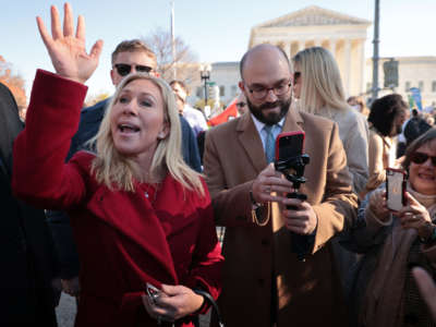 Rep. Marjorie Taylor Greene joins fellow anti-abortion activists in front of the U.S. Supreme Court on December 1, 2021, in Washington, D.C.