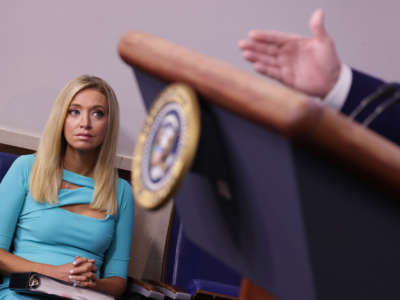 White House Press Secretary Kayleigh McEnany looks on as President Donald Trump speaks to the press during a news conference in the James Brady Press Briefing Room of the White House on September 16, 2020, in Washington, D.C.