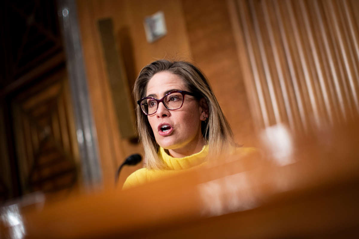 Sen. Kyrsten Sinema speaks during a Senate Homeland Security and Governmental Affairs Committee confirmation hearing on February 1, 2022, in Washington, D.C.