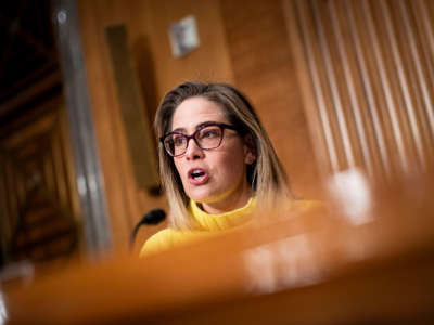 Sen. Kyrsten Sinema speaks during a Senate Homeland Security and Governmental Affairs Committee confirmation hearing on February 1, 2022, in Washington, D.C.