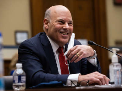 United States Postal Service Postmaster General Louis DeJoy speaks during a House Oversight and Reform Committee hearing February 24, 2021, on Capitol Hill in Washington, D.C.