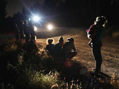 U.S. Border Patrol agents arrive to detain a group of Central American asylum seekers near the U.S.-Mexico border on June 12, 2018, in McAllen, Texas.