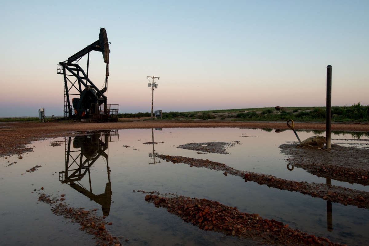 A pump jack is in use in Bainville, Montana, on September 10, 2013.