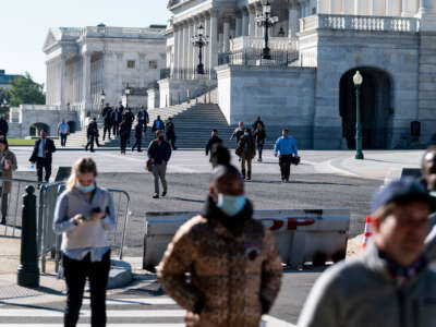 Staffers walk across the East Plaza during an evacuation drill of the Capitol and all the office buildings on November 8, 2021.