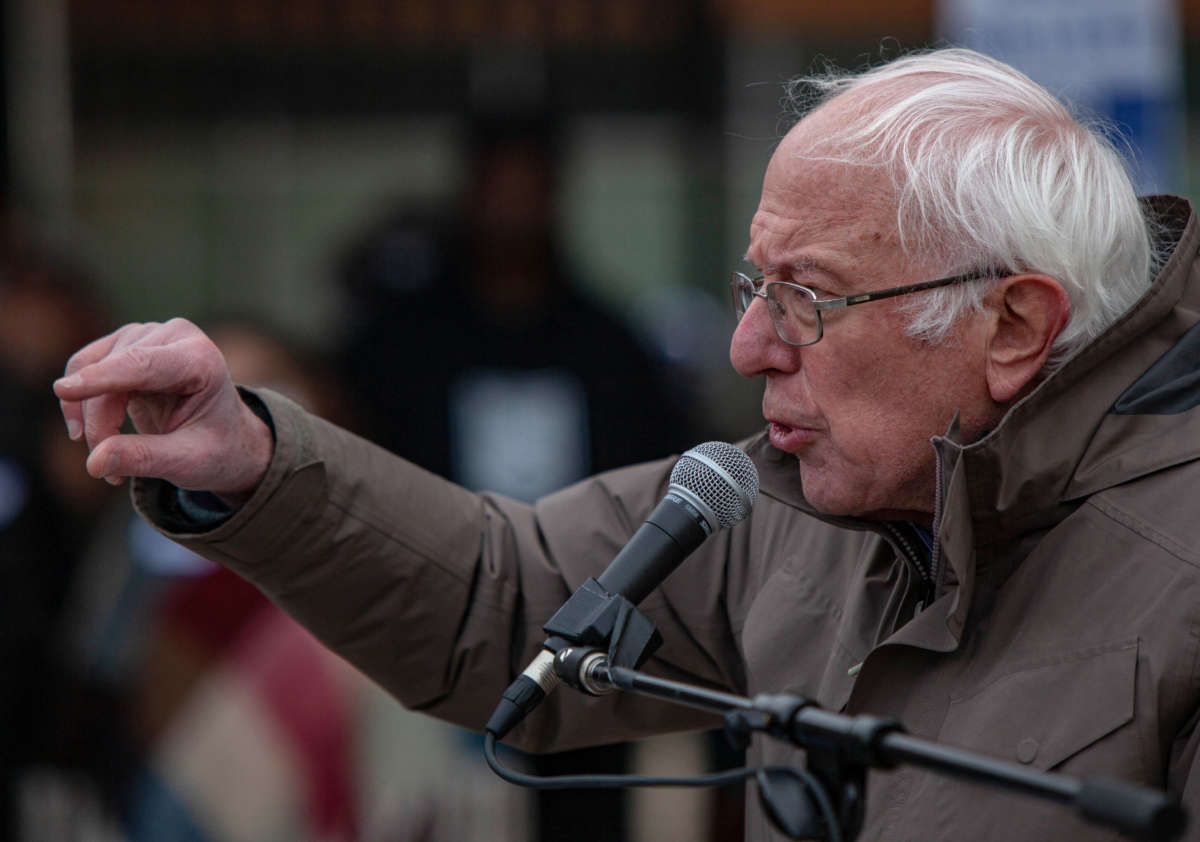 Sen. Bernie Sanders gestures as he speaks to striking Kellogg's workers in downtown Battle Creek, Michigan, on December 17, 2021.