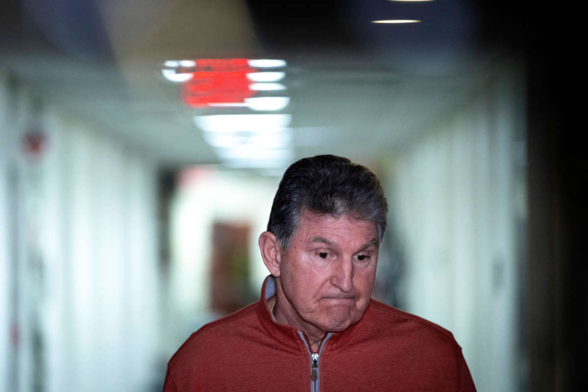 Sen. Joe Manchin speaks to reporters before a caucus meeting with fellow Senate Democrats on Capitol Hill January 18, 2022, in Washington, D.C.