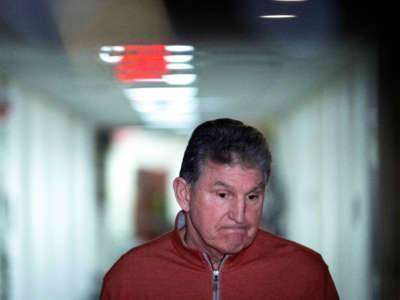 Sen. Joe Manchin speaks to reporters before a caucus meeting with fellow Senate Democrats on Capitol Hill January 18, 2022, in Washington, D.C.