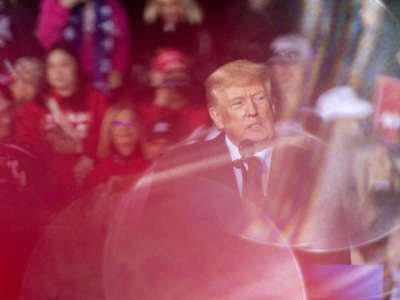 Former President Donald speaks to a crowd a rally at the Montgomery County Fairgrounds on January 29, 2022, in Conroe, Texas.